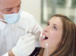 Зачем лечить зубы во время беременности?